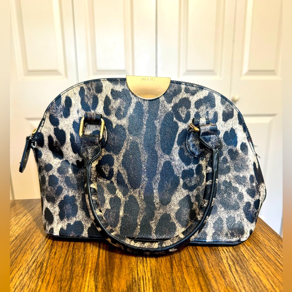 Leopard Aldo purse.